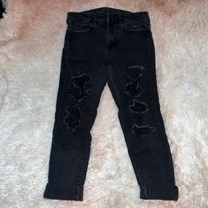 Black shredded skinny jeans